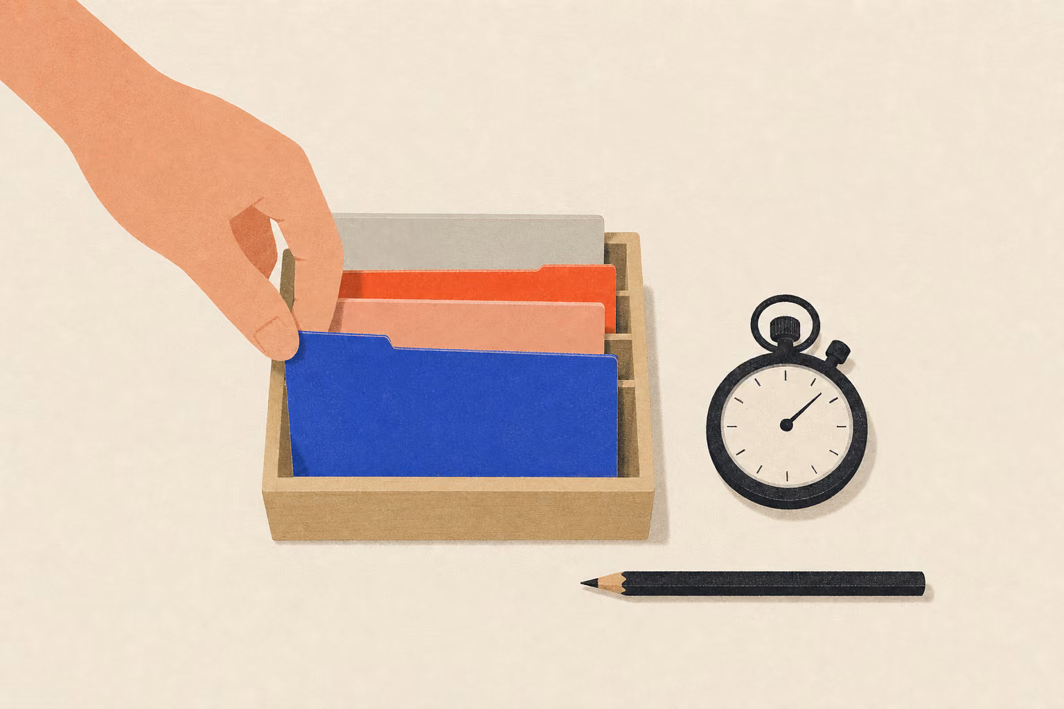 Un organiseur de bureau contient des cartes de projet vierges près d’un chronomètre et d’un crayon