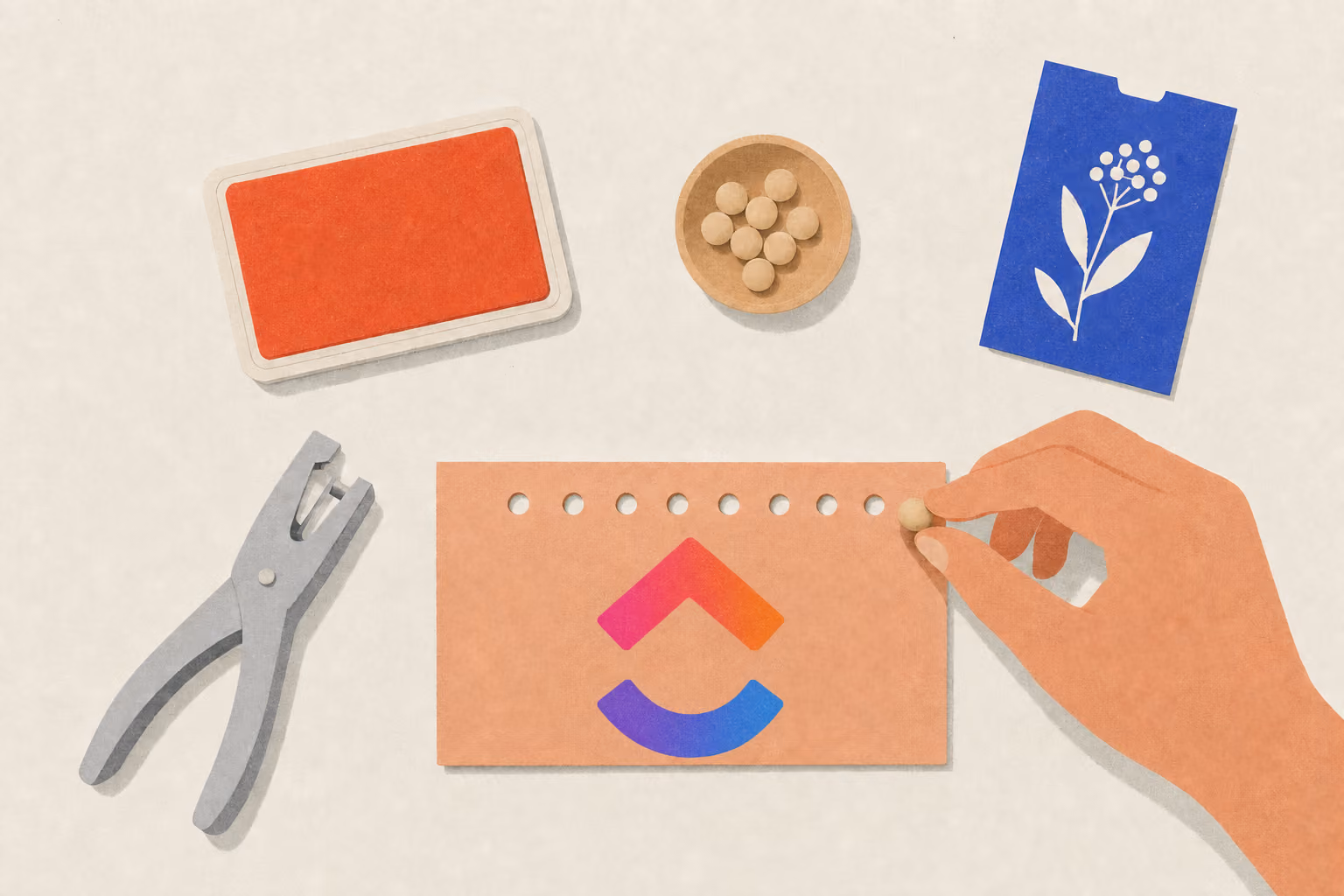 A hand places a bead into the next empty hole on a punch card beside a hand punch and seed packet