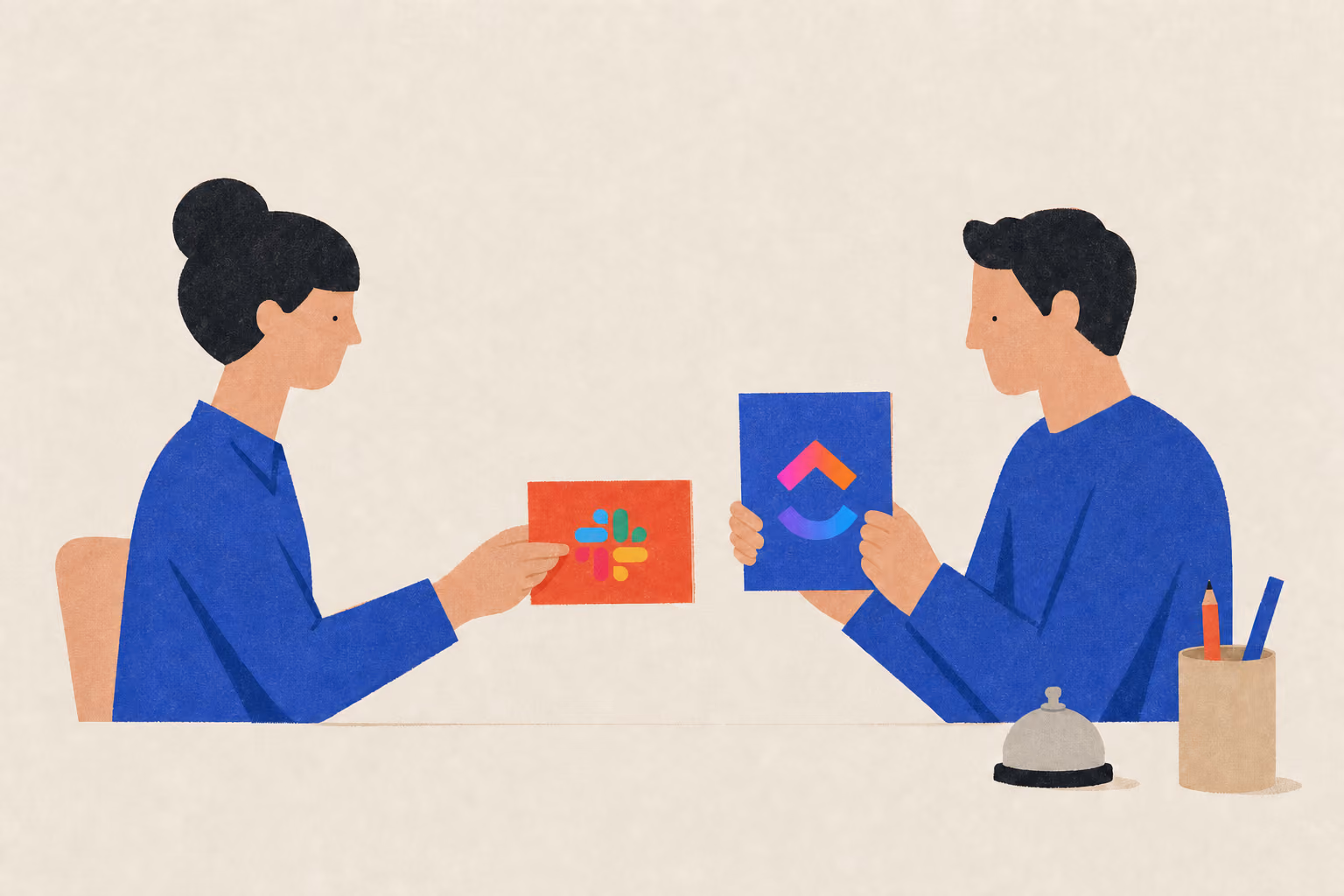 One person slides a message envelope toward a task card held by another person